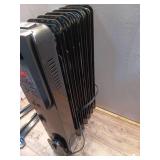1500-Watt Black Indoor Electric Oil-Filled Radiator Convection Radiant Space Heater with Remote Control for Living Space - Retail: $100