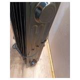 1500-Watt Black Indoor Electric Oil-Filled Radiator Convection Radiant Space Heater with Remote Control for Living Space - Retail: $100