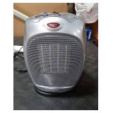 Amazon Basics Oscillating Ceramic Space Heater, Portable Indoor Heating Solution, With Overheat and Tip-Over Protection, Thermostat, 1500W, 7.52D x 6.34W x 9.45H, Silver