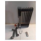 1500-Watt Black Indoor Electric Oil-Filled Radiator Convection Radiant Space Heater with Remote Control for Living Space - Retail: $100