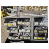 Industrial Hardware Storage Bin Unit with Uncut Keys and Plastic Bags