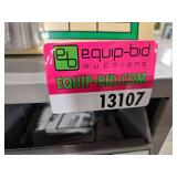 Industrial Hardware Storage Bin Unit with Uncut Keys and Plastic Bags