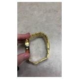 Gold Tone Watch with Blue Roman Numeral Dial