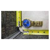 Gold Tone Watch with Blue Roman Numeral Dial