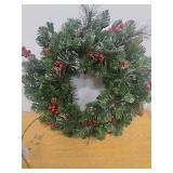 National Tree Company Pre-Lit Artificial Christmas Wreath Green Crestwood® Spruce Clear Lights  Decorated with Pine Cones  Berry Clusters  24 Inches