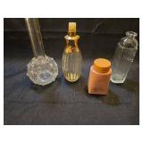 Collection of Glass Perfume Bottles and Pink Container