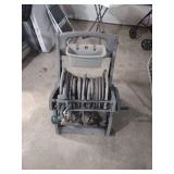 Plastic roll away garden hose