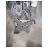 Plastic roll away garden hose