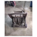 Plastic roll away garden hose