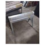 Metal folding sawhorse