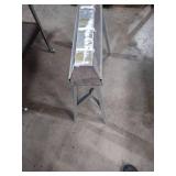 Metal folding sawhorse