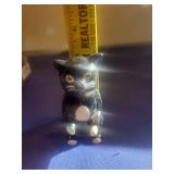 Black and White Plastic Cat Figurine