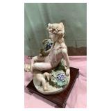 Classical Porcelain Figurine with Grapes and Cherub