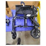 Medline Ultra Lightweight Transport Wheelchair for Adults  Foldable  19-Inch Seat Width  Black - Retail: $50