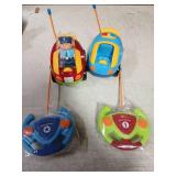 Prextex 2 Pack Cartoon Remote Control Cars for Toddlers - Police Car and Race Car with Steering Wheel Controllers and Lights - Different Frequencies So Both Can Race Together - Toddler Gift 18+ Months