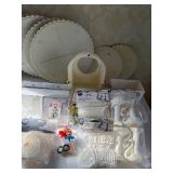 Cake Decorating Items and Candy Molds in a Basket
