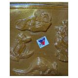 Cake Decorating Items and Candy Molds in a Basket