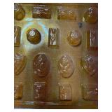 Cake Decorating Items and Candy Molds in a Basket