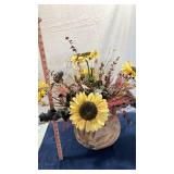 Decorative Floral Display with Sunflowers and Concrete Orb