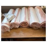 5 rolls of 22 in fiberglass insulation with plastic backing and clips