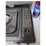 Brand new Portable Gas Range with lot of cans of Butane
