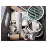 Crate full of plumbing items