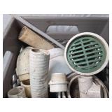 Crate full of plumbing items