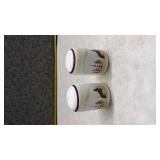 White Ceramic Salt and Pepper Shakers with Wolf and Pine Tree Design