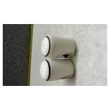 White Ceramic Salt and Pepper Shakers with Wolf and Pine Tree Design