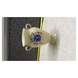 Decorated Ceramic Vase with Blue Shield Design