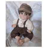 Collectible Porcelain Doll in Newsboy Outfit