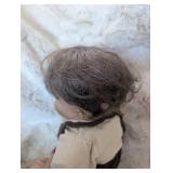 Collectible Porcelain Doll in Newsboy Outfit