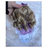 Collectible Porcelain Doll in Purple Dress