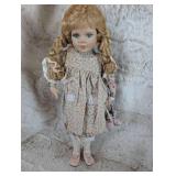 Collectible Porcelain Doll in Floral Prairie Dress