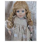 Collectible Porcelain Doll in Floral Prairie Dress