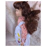 1980s Porcelain Doll with Floral Dress and Pinafore
