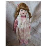 Elegant Porcelain Doll in Pink Satin and Lace