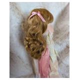 Elegant Porcelain Doll in Pink Satin and Lace