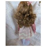 Elegant Porcelain Doll in Pink Satin and Lace