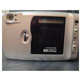 HP PhotoSmart 215 Digital Camera and Polaroid PDC640