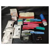 Mixed Lot - NIP Personal Items, Digital Electronic Exercise Plus Monitor, Gloves, Lint Remover, Combs, Adult Ponchos and Umbrella