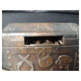 Vintage Rocky Mountain Iron Lock Piggy Bank Filled with Pennies