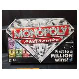 Monopoly Millionaire Board Game Bundle with Wooden Checkers Chest and Garfield Cards