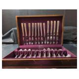 4 piece Oneida William A Rogers Silverplate flatware set and Prestige Plate flatware and serving pieces set in Wooden Storage Chest