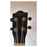 Lanikai Black Electric Bass Ukulele with Gold Trim