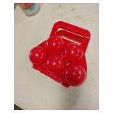 red plastic 5-in-1 snowball maker