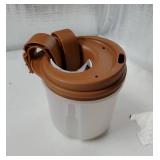 Regulating Drinking Cup, Dispenses 10cc of Liquid Each time the Cup is Put Down and Lifted - Retail: $43