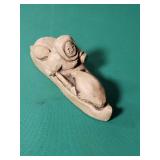 Earthquake Clay Handcrafted Eskimo in a Kyack. 6x2.5 Inches