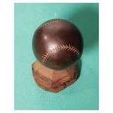 Hand Carved Ironwood Baseball on Base. 6 Inches