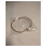 Gold Tone Love Knot Cuff Bracelet